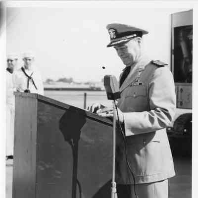 Man speaking at christening of LST-1166, September 9, 1953
