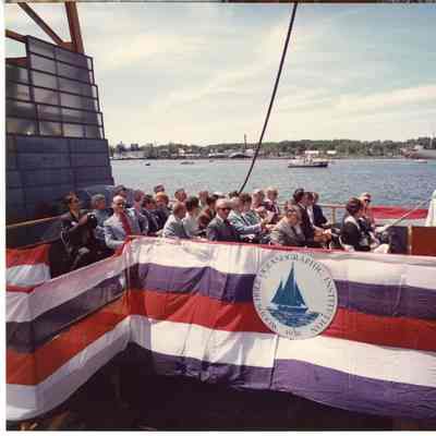 PBI ship Oceanus launch speaker's podium with people