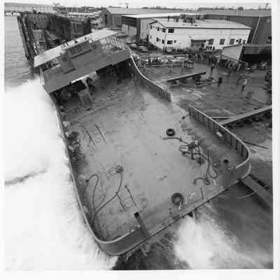 PBI launching of small car ferry hitting the water