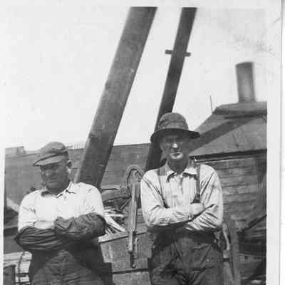 Two divers standing next to each other