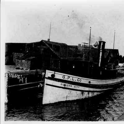 G.P.L. Co. Duncan City tug moored at pier