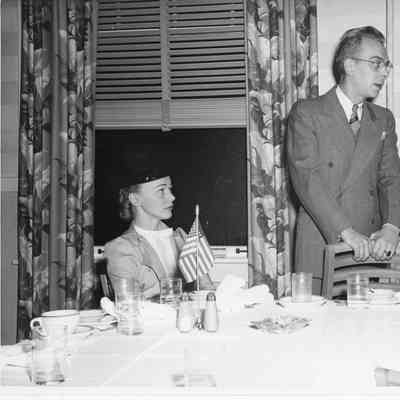 E.A. Ander and wife at dining table during E award