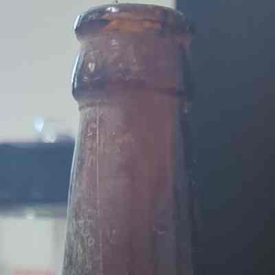Dirty brown glass bottle