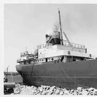 J.A. Campbell rocks in foreground 1953