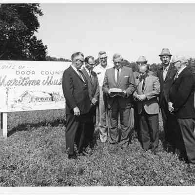 Group photograph at groundbreaking of Door County Maritime Museum in Gills rock