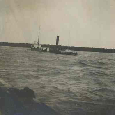 Ship riding low in water