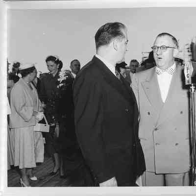 Senator McCarthy and Mr. Christianson before microphone during Christening of LST-1170 May 22, 1954