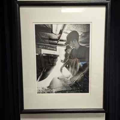 Framed photograph of Matthew Johnson and Jeremy Brisson aboard Freitag