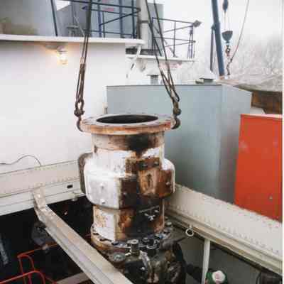 Medusa Challenger engine cylinder being removed from engine room January 1998