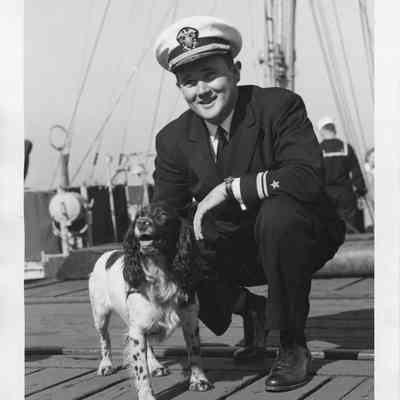 Officer and dog on USS PC-1176
