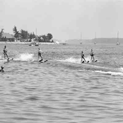 four children water skiing
