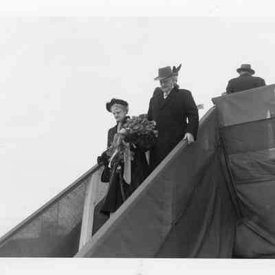 Christening party leaving sponsor box post-christening of Chicago Fire Baot 1949