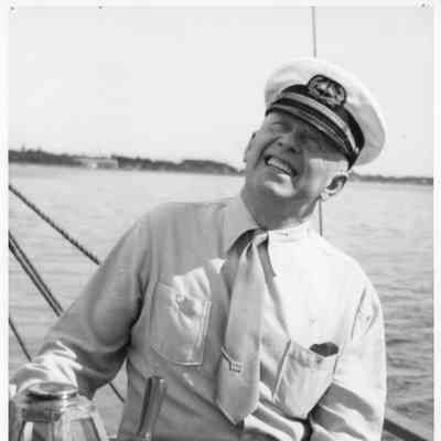 Halfmoon yacht with Captain John Roen at helm