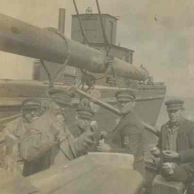 Workers eating on vessel