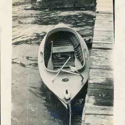 Duckboat tied to pier