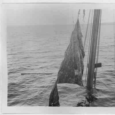 Half Moon being raised with mast and sails above water