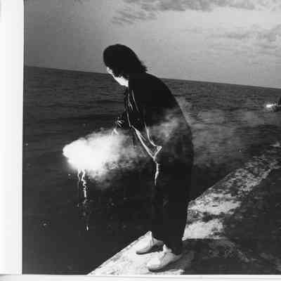 Men holding flares at Sturgeon Bay ship canal