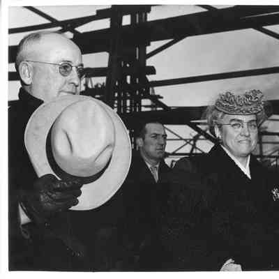 L.D. Smith, Elton Washburn and ship sponsor at christening of K-213 Sussex