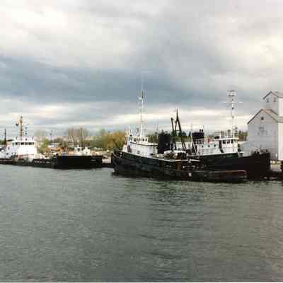 Carl M. Selvick, James Selvick, and USCGC Mobile Bay docked in Sturgeon Bay 1992