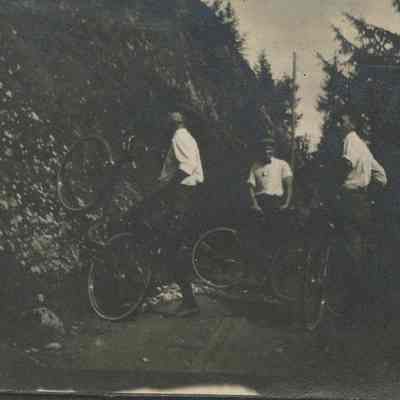 Young men with bicycles