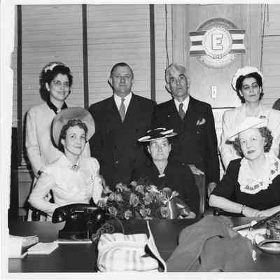 8 people at christening for net tender Passdic