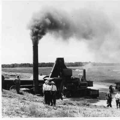 Men and equipment with potatoes on Washington Island