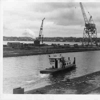 Tugboat leaving dock