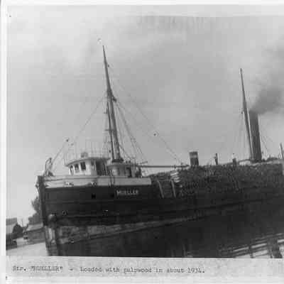 Steamer Mueller loaded with pulpwood underway