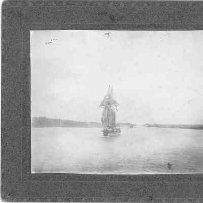 sailing ship coming through canal