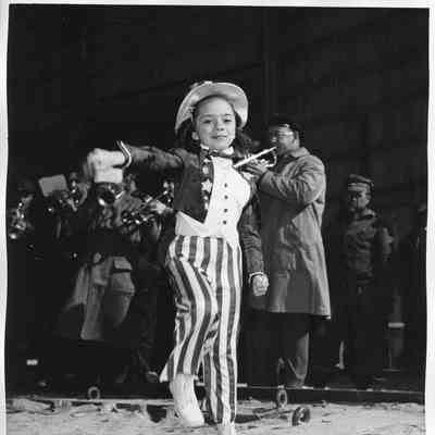 Child in USA themed suit at christening of PF-64 Uss Knoxville