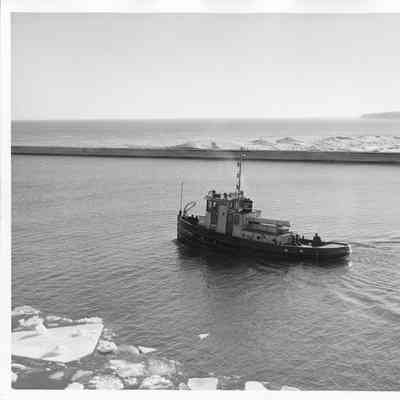 US Engineer Department tug Moore underway in winter