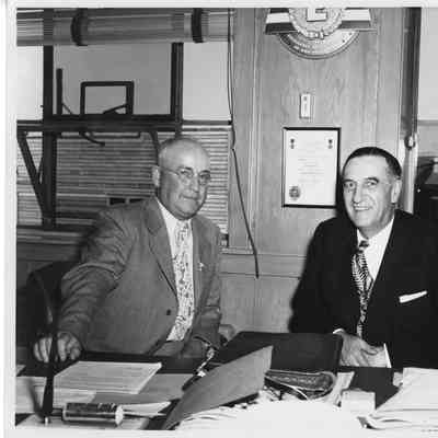 L.D. Smith and man sitting at table