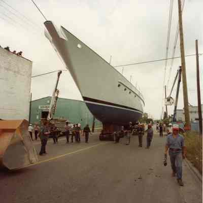 Ondine being towed through street