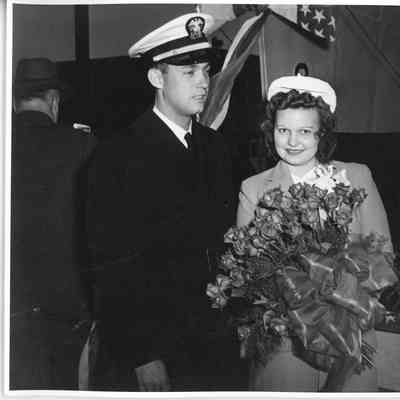 Betty Lau and Ensign E. Les Williams at christening of PC-1171 1943