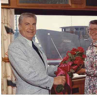 PBI ship Oceanus priest talking at podium