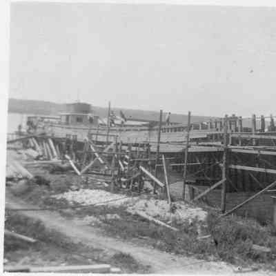 Men constructing ship