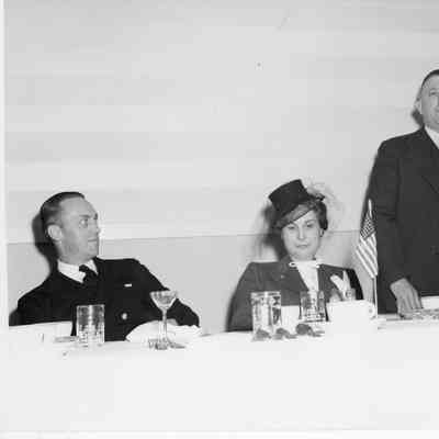 C. Ray Christianson and wife at dining table during E award