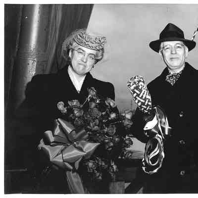 Ship sponsor holding flower and man holding christening bottle at christening of K-213 Sussex