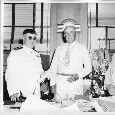Unidentified man in white uniform