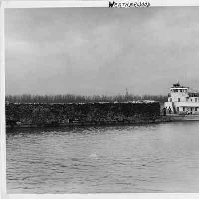 Weatherwood towing barge loaded with lumber