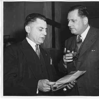 Captain C.R. Polinghorne and W.G. Bartenfeld at United Nations Party at Smith Sports Club 1943