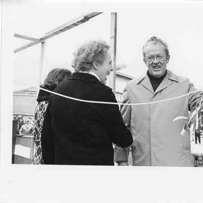 PBI Bob Peterson and two women at Christening
