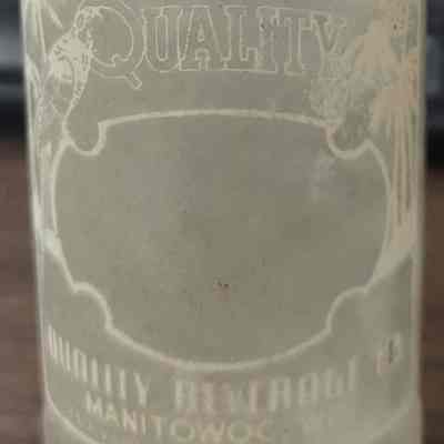 Quality Beverage Co. glass bottle