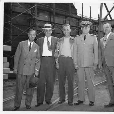 L.D. Smith and C. Ray Christianson with unidentified men