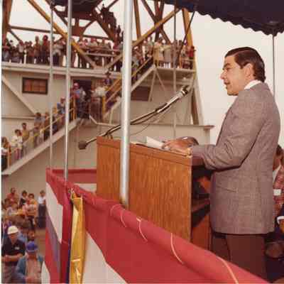 Speaker at podium during christening of Napolean