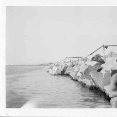 Man sitting on Milwaukee South Shore breakwater