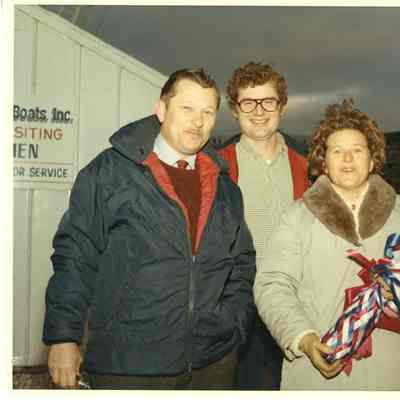 Two people at Kittywake christening with Mike Kelsey