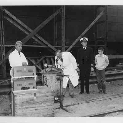 C. Ray Christianson and three others at Badger launching September 6, 1952