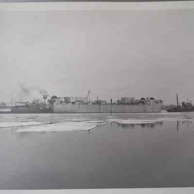 LST-1167 and two tugs