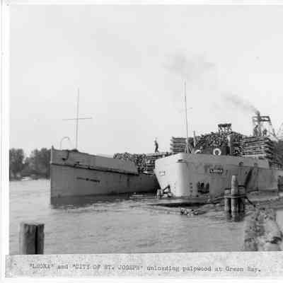 Leone and City of St. Joseph unloading pulpwood